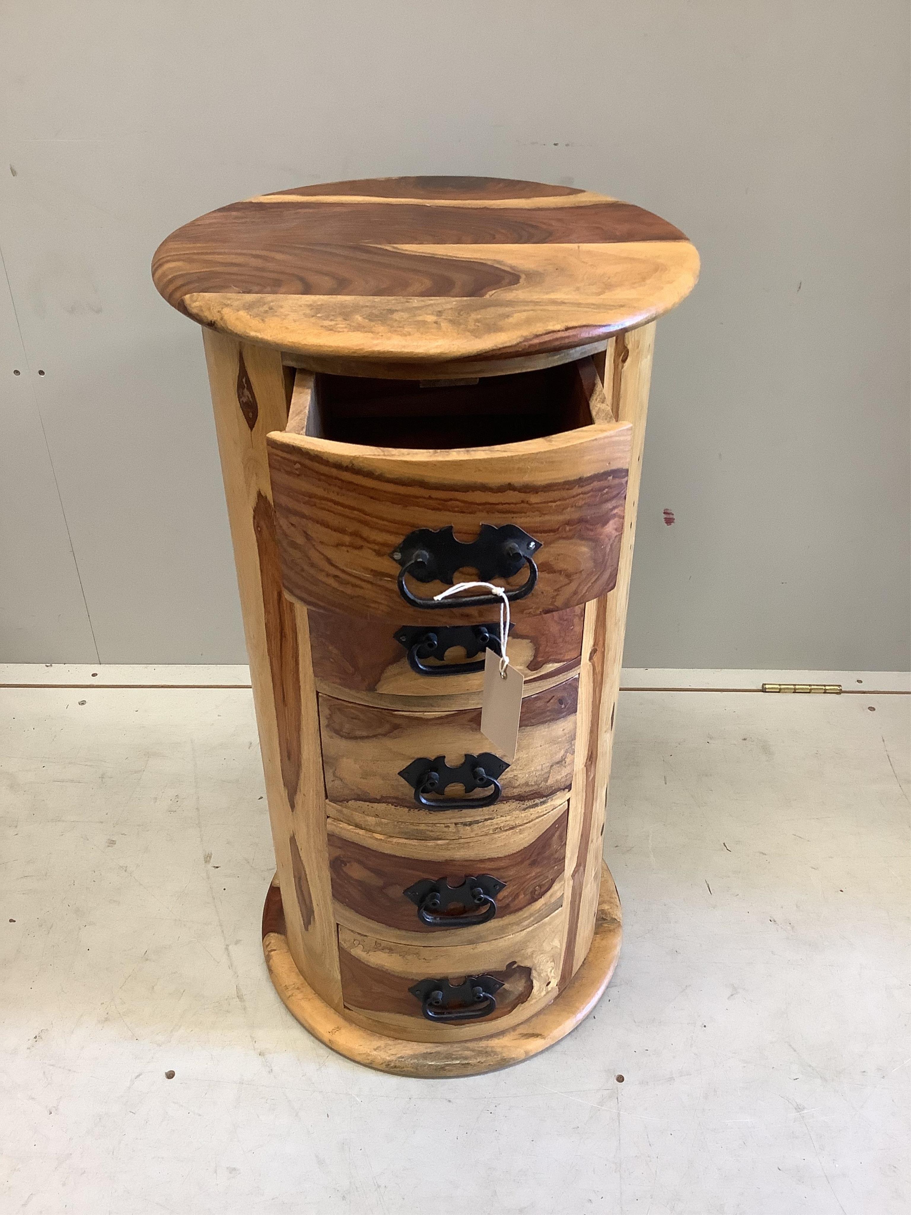 Two modern hardwood cylindrical chests of drawers, larger diameter 40cm, height 75cm